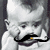 http://www.dogglounge.com/smilies/babystache.gif